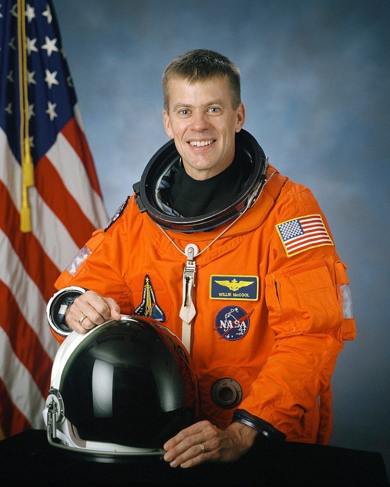 Picture of CDR McCool in spacesuit
